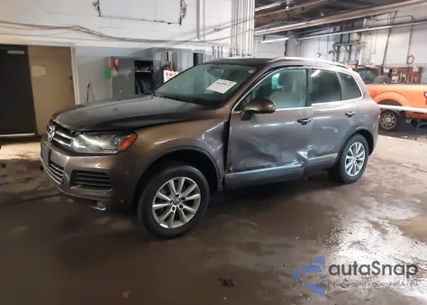 2014 Volkswagen Touareg 3.6L Sport from USA, damaged, VIN WVGEF9BP4ED006768